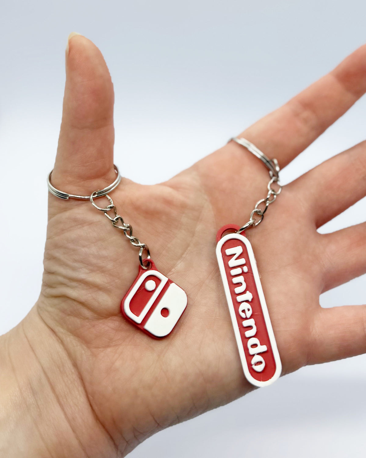 Schlüsselanhänger mit Nintendo- oder Switch-Logo